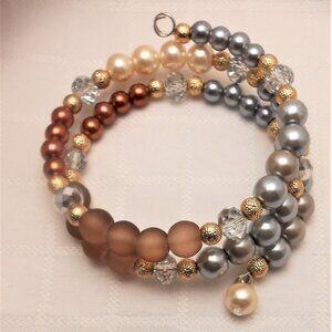 Handmade jewelry set with memory wire bracelets and asymetrical earrings